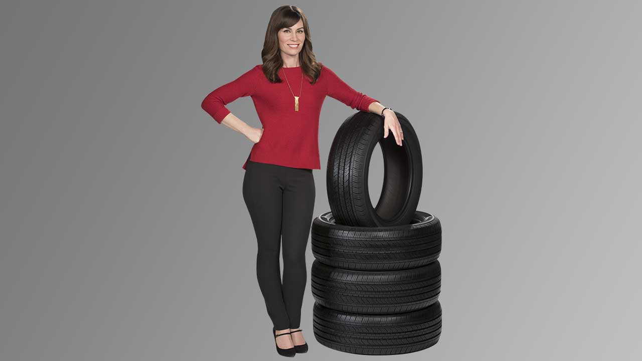 Jan with stack of tires