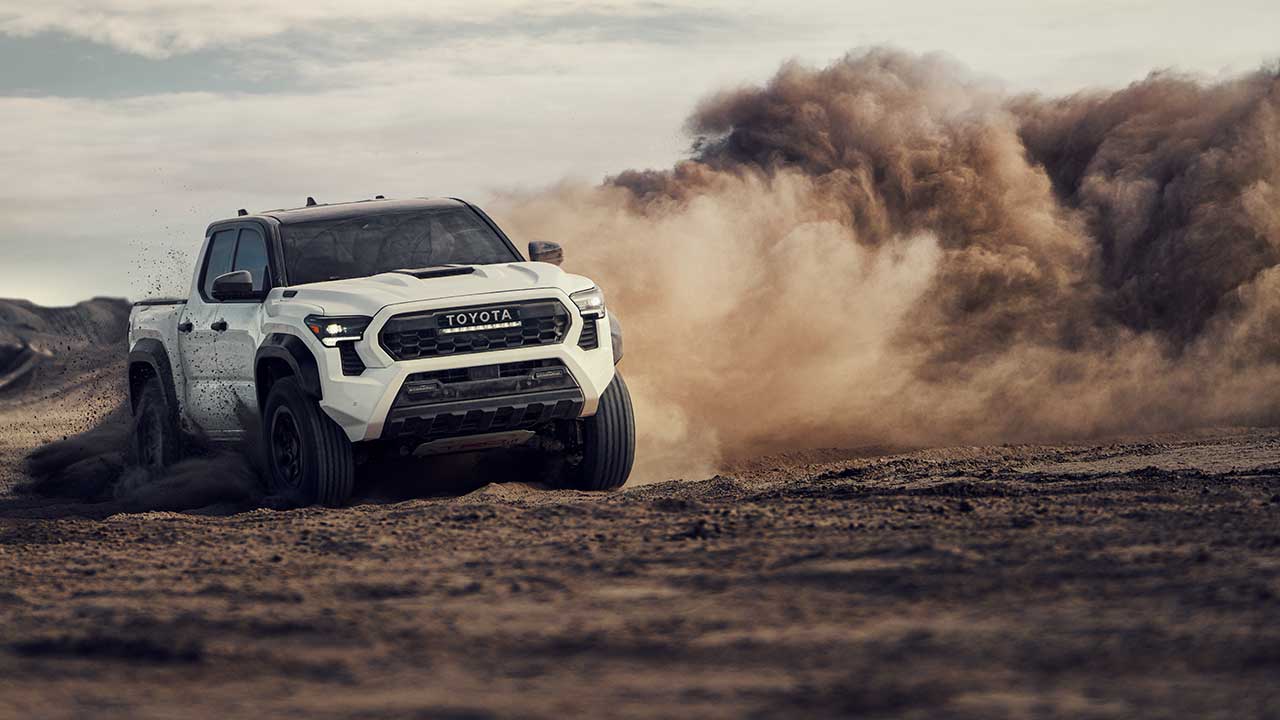 Couple camping with their 2022 Toyota Tacoma