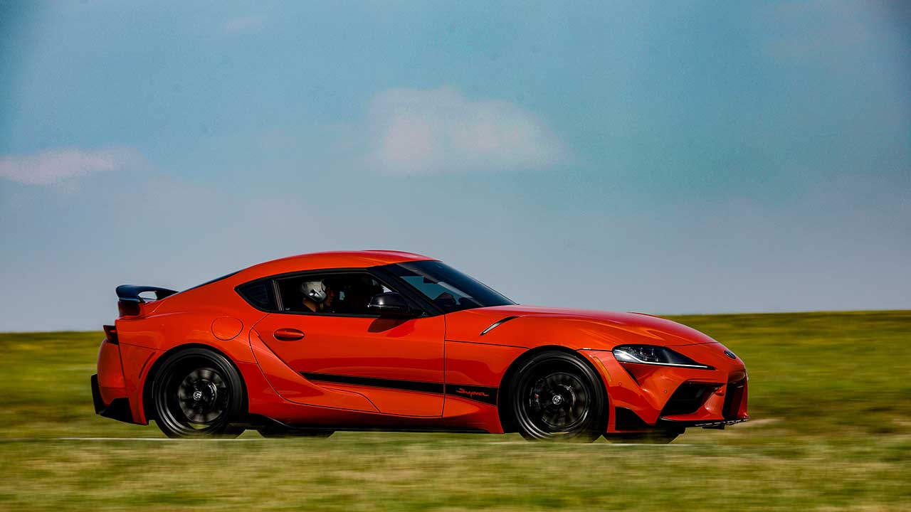 2024 Toyota Supra on grassy road