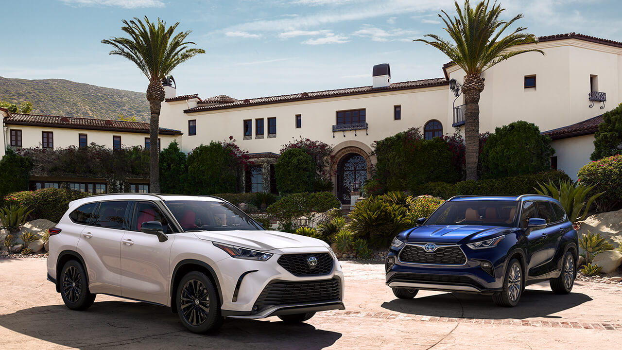 Two Toyotas in a driveway